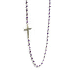 Trendy necklace with cross detail and string of natural stones